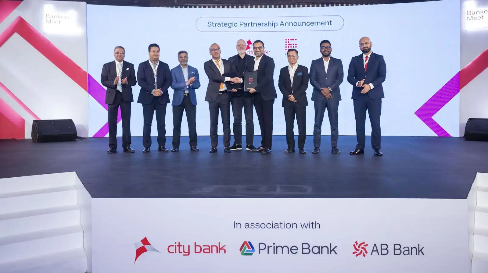 A group picture of representatives from Filps and AB Bank PLC, Bangladesh including Filps CEO Biswas Dhakal, Filps Country Manager in Bangladesh Tushar Hasan, Filps Chief Strategy Officer Daniel D Shrestha, Filps Chief Partnership Officer Rishikesh Nepal, Filps Board Advisor Brett King, and City Bank Bangladesh MD & CEO Mashrur Arefin, among others.